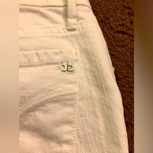Cropped white Joes jeans.